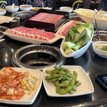Haidilao Hotpot - The cold appetizers and condiments from the sauce bar, The beef and lamb from the happy hour set, The vegetable platter, All four soup bases - Chinese Near Me - Arcadia, California Haidilao Hotpot - The cold appetizers and condiments from the sauce bar, The beef and lamb from the happy hour set, The vegetable platter, All four soup bases - Chinese Near Me - Arcadia, California