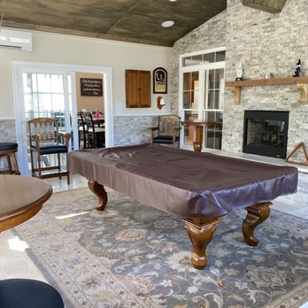 Deck Plus - a pool table in the middle of a living room - Decks & Railing Near Me - Matthews, North Carolina