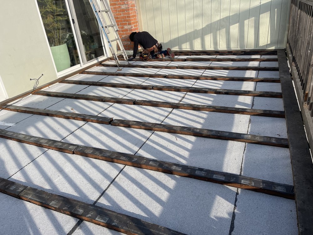 Slide of Fili's Roofing