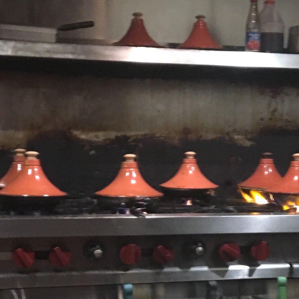 Tara Kitchen - Tagines cooking on the stove. Open kitchen is awesome. - Moroccan Near Me - Schenectady, New York Tara Kitchen - Tagines cooking on the stove. Open kitchen is awesome. - Moroccan Near Me - Schenectady, New York