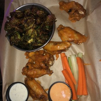 The Annex Crafthouse - Sirracha glazed Brussel sprouts and traditional wings with Elvis sauce - Southern Near Me - Houston, Texas