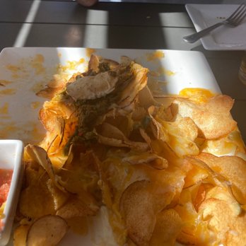 Yo Mama's Grill - Housemade chips, cheddar jack and chili queso with a side of salsa - New American Near Me - Socorro, New Mexico
