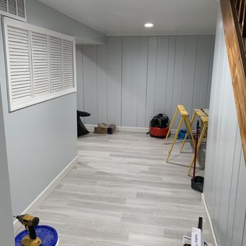Limitless Home Renovations - a room with a hard wood floor - General Contractors Near Me Limitless Home Renovations - a room with a hard wood floor - General Contractors Near Me