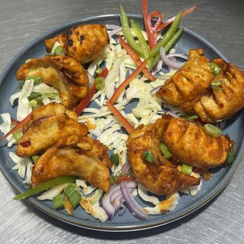 Mumbai Frankie Georgetown - a plate of chicken wings and vegetables - Indian Near Me - Georgetown, Ontario Mumbai Frankie Georgetown - a plate of chicken wings and vegetables - Indian Near Me - Georgetown, Ontario