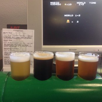 8-Bit Aleworks - My flagship sampler in a Mario pipe holder with my Super Mario Bros game in the background. - Bars Near Me - Avondale, Arizona