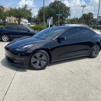 Innovation Window Tinting - Tesla's are our specialty our installers are capable of tinting the larger back window and larger sunroofs in one piece. - Car Window Tinting Near Me - Naples, Florida Innovation Window Tinting - Tesla's are our specialty our installers are capable of tinting the larger back window and larger sunroofs in one piece. - Car Window Tinting Near Me - Naples, Florida