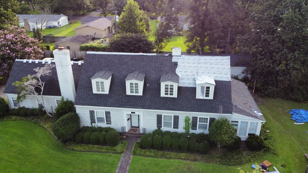 Slide of RiverLand Roofing