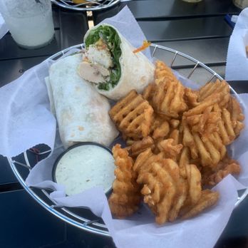 Eagle’s Nest Bar & Grill - Grilled chicken wrap with waffle fries - Burgers Near Me - Clarklake, Michigan Eagle’s Nest Bar & Grill - Grilled chicken wrap with waffle fries - Burgers Near Me - Clarklake, Michigan