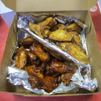 Atlanta's Best Wings - 20-piece wings: honey garlic pepper (top), mild teriyaki (bottom). - Chicken Wings Near Me - Decatur, Georgia Atlanta's Best Wings - 20-piece wings: honey garlic pepper (top), mild teriyaki (bottom). - Chicken Wings Near Me - Decatur, Georgia