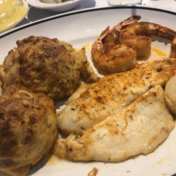 By The Docks Restaurant - Broiled seafood platter with flounder fish, shrimps, carb cake scallops and stuffed oyster. - Seafood Near Me - Middle River, Maryland By The Docks Restaurant - Broiled seafood platter with flounder fish, shrimps, carb cake scallops and stuffed oyster. - Seafood Near Me - Middle River, Maryland