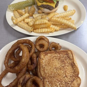 Smiths Restaurant - Pimento cheese sandwich and onion rings in the foreground and a burger and fries in the background - Breakfast & Brunch Near Me - Rocky Mount, North Carolina Smiths Restaurant - Pimento cheese sandwich and onion rings in the foreground and a burger and fries in the background - Breakfast & Brunch Near Me - Rocky Mount, North Carolina