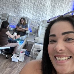 Enjoying her massage and foot  nail treatment