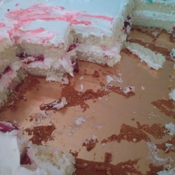 Albertsons - a half eaten cake with pink frosting - Grocery Near Me - Corona, California