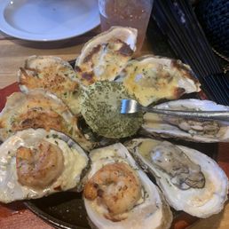 Oyster quad: butter garlic, smoked gouda, Rockefeller, shrimp boss