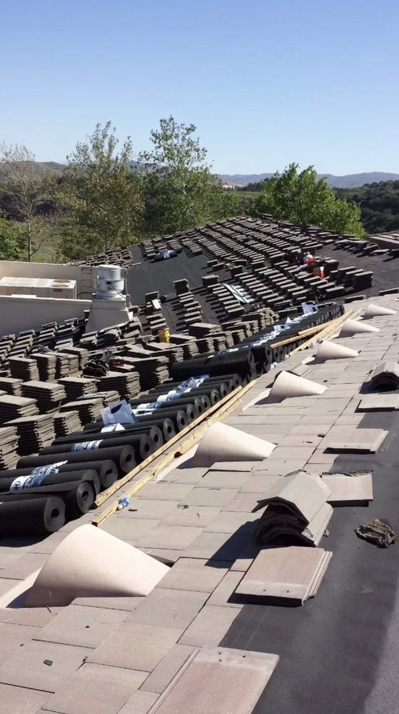 Slide of Romero's Roofing