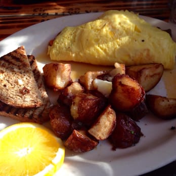 Fig Tree Cafe - Andouille sausage omelette, potatoes and wheat toast - Breakfast & Brunch Near Me - San Diego, California Fig Tree Cafe - Andouille sausage omelette, potatoes and wheat toast - Breakfast & Brunch Near Me - San Diego, California