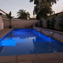 a pool in a backyard a pool in a backyard