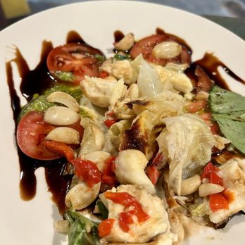 Dueling Spoons - Roasted onion - baked onion stuffed with roasted red peppers, garlic, basil & mozzarella served over tomatoes & balsamic reduction. - Salad Near Me - Fall Creek, Oregon Dueling Spoons - Roasted onion - baked onion stuffed with roasted red peppers, garlic, basil & mozzarella served over tomatoes & balsamic reduction. - Salad Near Me - Fall Creek, Oregon