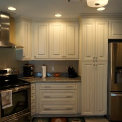 John Sun Kitchen & Bath - Cream Maple Cabinets w/Caramel Glaze; Butterfly Yellow Countertops