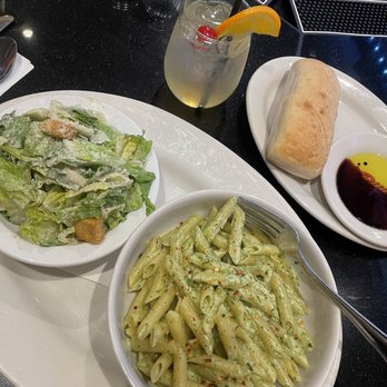Buca di Beppo Italian Restaurant - Caesar salad with the pesto pasta.... bread with oil and balsamic. - Italian Near Me - Las Vegas, Nevada
