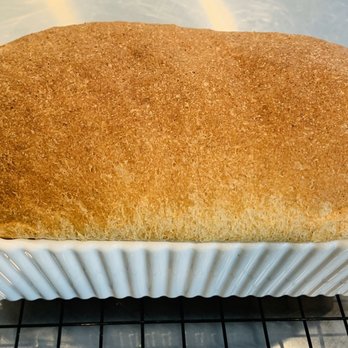 Sweet 31 Baking - a loaf of bread on a cooling rack - Bakeries Near Me - Wendell, North Carolina