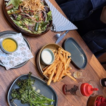 The Pro - Charred broccolini, battered fries, and Cali crunch salad - American Near Me - Palo Alto, California The Pro - Charred broccolini, battered fries, and Cali crunch salad - American Near Me - Palo Alto, California