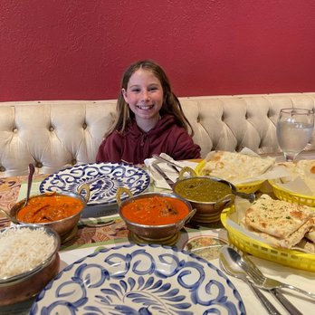 5th Element Indian Cuisine - Chicken tikka masala butter chicken side paneer butter naan  -garlic naan and white rice - Indian Near Me - Palm Coast, Florida