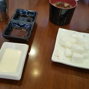 The Basac - Three types of dipping sauce, cup of broth, and a side of pickled radish. - Korean Near Me - Flushing, New York