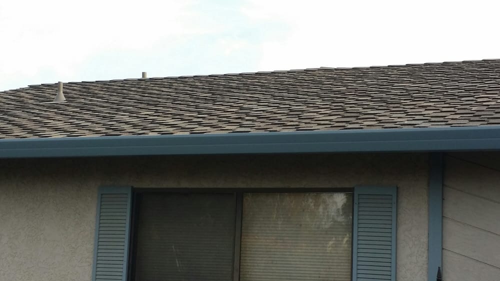 Slide of Earl Deal Roofing