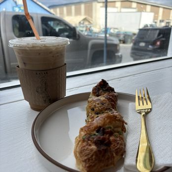 Kayak Cafe - Iced americano with caramel and cream, savory breakfast pastry with bacon. - Sandwiches Near Me - Cordova, Alaska Kayak Cafe - Iced americano with caramel and cream, savory breakfast pastry with bacon. - Sandwiches Near Me - Cordova, Alaska