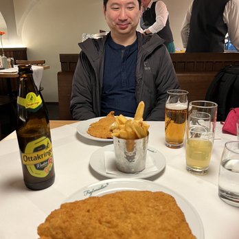Figlmüller - Schnitzel (half portion!) and fries with a radler - Austrian Near Me - Vienna, 9 Figlmüller - Schnitzel (half portion!) and fries with a radler - Austrian Near Me - Vienna, 9