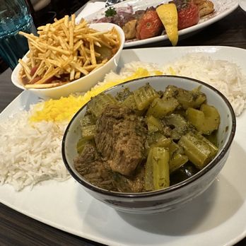 Herby Restaurant - Gheymeh (background) and Khoresht Karafs - two delicious stews - Persian/Iranian Near Me - Toronto, Ontario Herby Restaurant - Gheymeh (background) and Khoresht Karafs - two delicious stews - Persian/Iranian Near Me - Toronto, Ontario