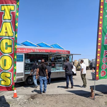Guanatos Tacos - Truck located on large dirt lot with parking. - Food Trucks Near Me - Fremont, California