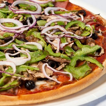 Dean's Pizza - The Combo.  This one made us famous, loaded with all your favorites.  Hope you're hungry! - Pizza Near Me - Turlock, California