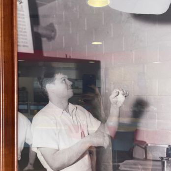 Domino's Pizza - a man holding a pizza cutter - Pizza Near Me - Presque Isle, Maine Domino's Pizza - a man holding a pizza cutter - Pizza Near Me - Presque Isle, Maine