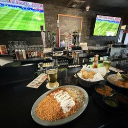 Lunch special 2 cheese enchiladas. Watching the World Cup after golf at Van nuys