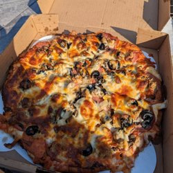 White Buffalo Saloon - Medium 12" Combo Pizza for $22.
