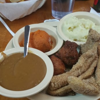 Cupboard Restaurant - My order : fried catfish mashed potatoes and gravy carrot souffle with jalapeno hush puppies. - Southern Near Me - Memphis, Tennessee