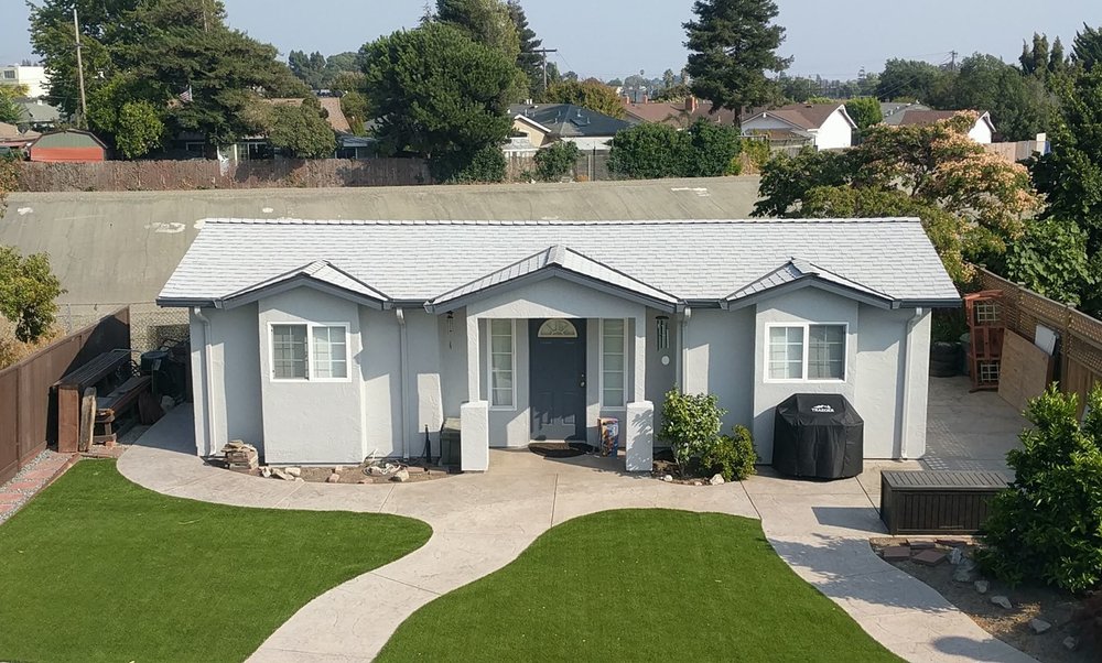 Slide of Manada Roofing