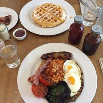 The Table - Waffle & bacon on top and a full English breakfast on the bottom. - British Near Me - London, XGL The Table - Waffle & bacon on top and a full English breakfast on the bottom. - British Near Me - London, XGL