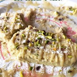 Quattro Archi di Grasso Rosario - (Half eaten) pistachio semifreddo