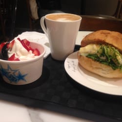 agnès b. Café LPG - Original and regular-size frozen yogurt with strawberries ($30), a hot latte ($36) and brie cheese and turkey brioche ($34)
