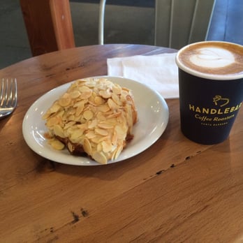 Handlebar Coffee Roasters - Almond croissant and a cappuccino. - Coffee Roasteries Near Me - Santa Barbara, California