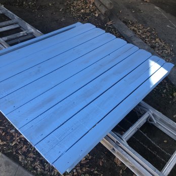 Miranda's Painting - Primer coat on the gate - the gate was a disaster. Miranda's sanded, primed and even fixed the way it hung on the posts. - Painters Near Me Miranda's Painting - Primer coat on the gate - the gate was a disaster. Miranda's sanded, primed and even fixed the way it hung on the posts. - Painters Near Me