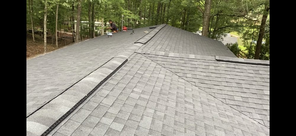 Slide of T & M Roofing