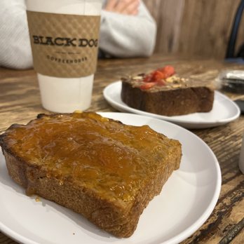 Black Dog Coffeehouse - a piece of bread and a cup of coffee - Coffee & Tea Near Me - Lenexa, Kansas Black Dog Coffeehouse - a piece of bread and a cup of coffee - Coffee & Tea Near Me - Lenexa, Kansas