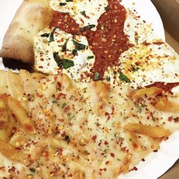 a pizza with cheese and sauce a pizza with cheese and sauce