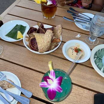 Old Lahaina Luau - Potatoe chips, hummus and pineapple - Performing Arts Near Me - Lahaina, Hawaii