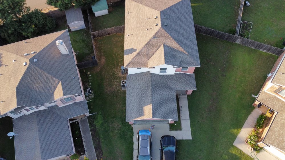 Slide of Uptown Roofing & Co