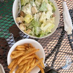 Caesar salad and fries